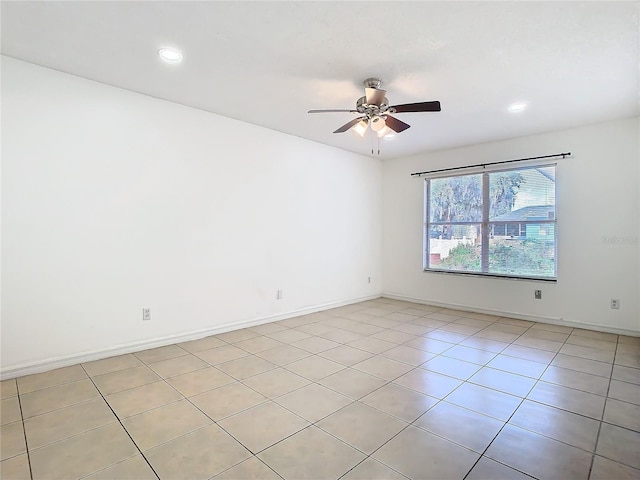 empty room featuring ceiling fan