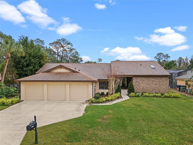 single story home featuring a garage and a front yard