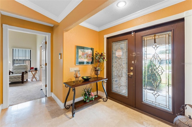 entrance foyer featuring french doors, a healthy amount of sunlight, crown molding, and light tile patterned flooring