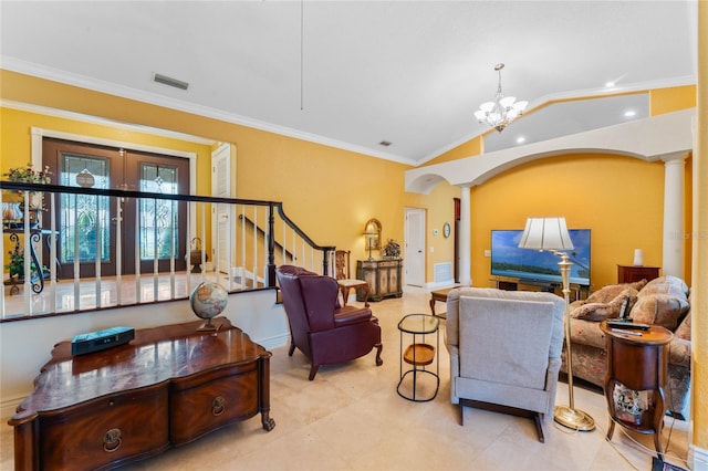 living room featuring decorative columns, vaulted ceiling, an inviting chandelier, and crown molding