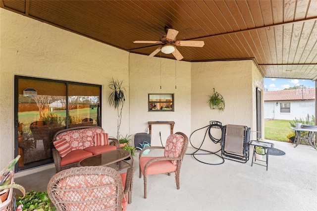 view of patio / terrace featuring an outdoor living space and ceiling fan