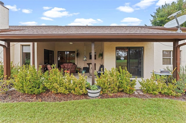 back of house with a yard