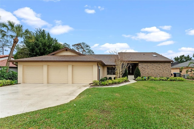 single story home featuring cooling unit, a garage, and a front lawn