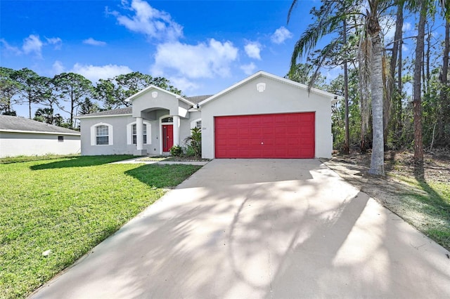 view of front of home featuring a garage and a front lawn