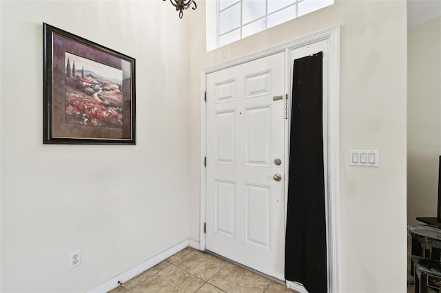 entrance foyer featuring light tile patterned floors