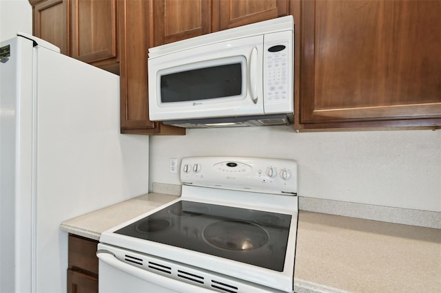 kitchen with white appliances