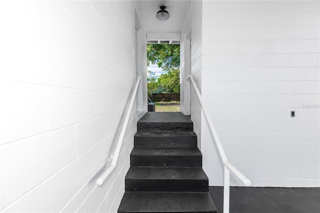 5508 Meridian Way, Orlando, FL 32808 - stairs featuring concrete block wall and concrete flooring