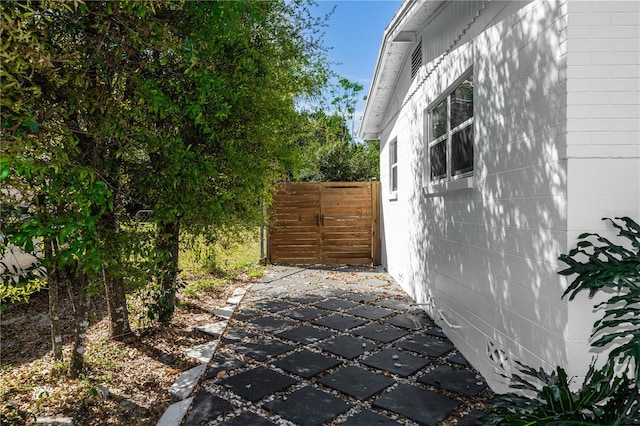 5508 Meridian Way, Orlando, FL 32808 - view of property exterior featuring concrete block siding and fence