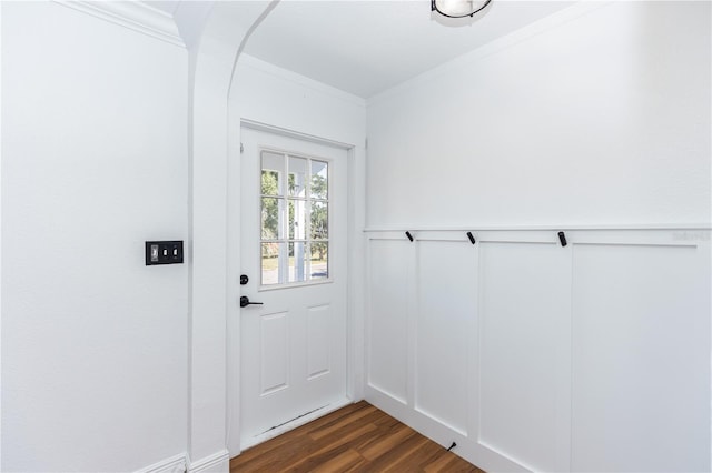 5508 Meridian Way, Orlando, FL 32808 - doorway to outside featuring dark wood-style floors, crown molding, and wainscoting