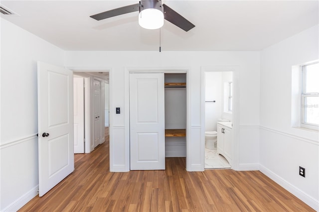 5508 Meridian Way, Orlando, FL 32808 - unfurnished bedroom with baseboards, visible vents, and light wood-style floors