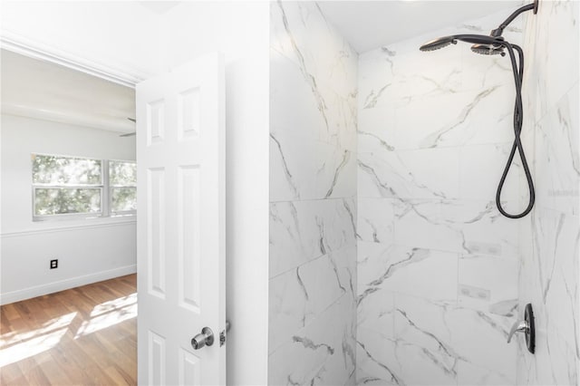 5508 Meridian Way, Orlando, FL 32808 - bathroom featuring baseboards, wood finished floors, and a marble finish shower