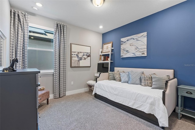 carpeted bedroom with baseboards and recessed lighting