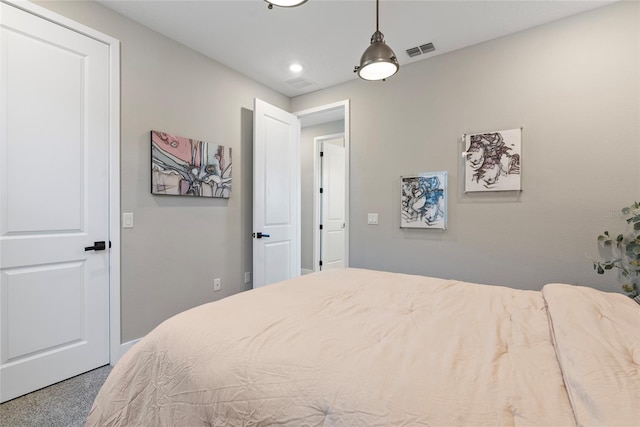 carpeted bedroom featuring visible vents and recessed lighting