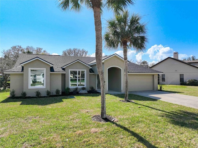 single story home featuring a garage and a front yard