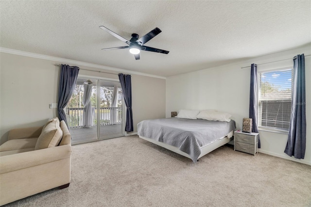 bedroom with crown molding, a ceiling fan, light carpet, a textured ceiling, and access to outside