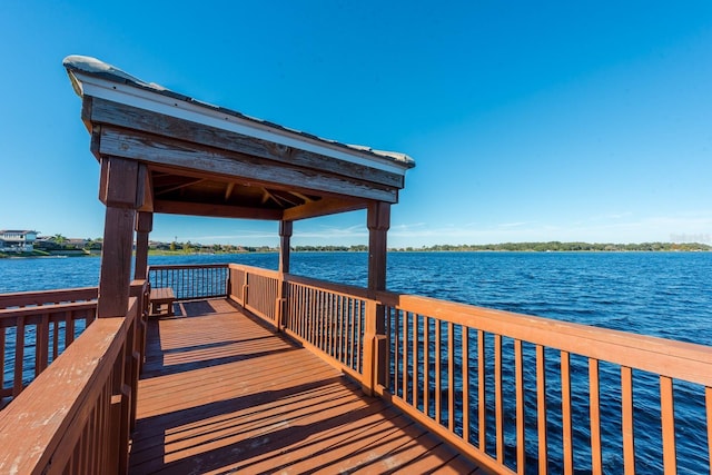 dock area with a water view and a gazebo