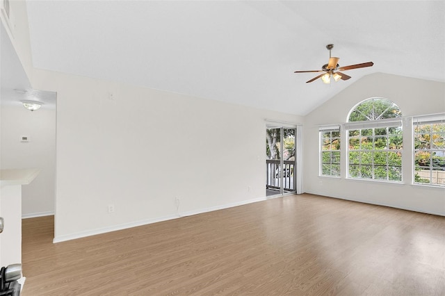 unfurnished living room featuring lofted ceiling, light hardwood / wood-style flooring, and ceiling fan