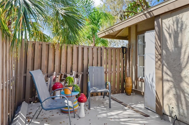 view of patio featuring a fenced backyard