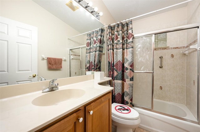 full bathroom with vanity, shower / tub combo, and toilet