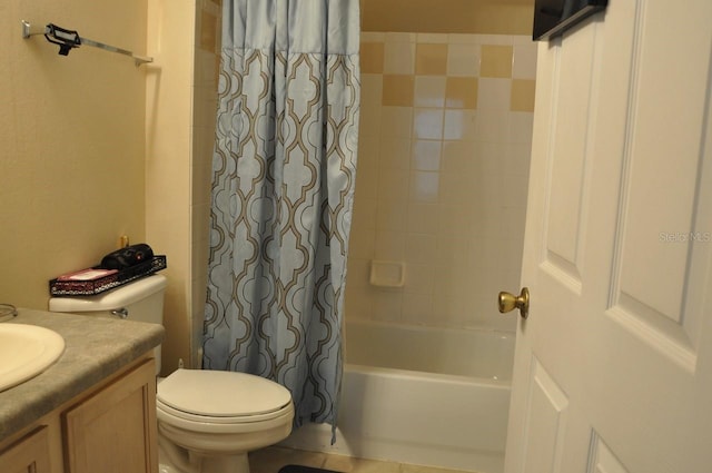 full bathroom featuring shower / bathtub combination with curtain, vanity, and toilet