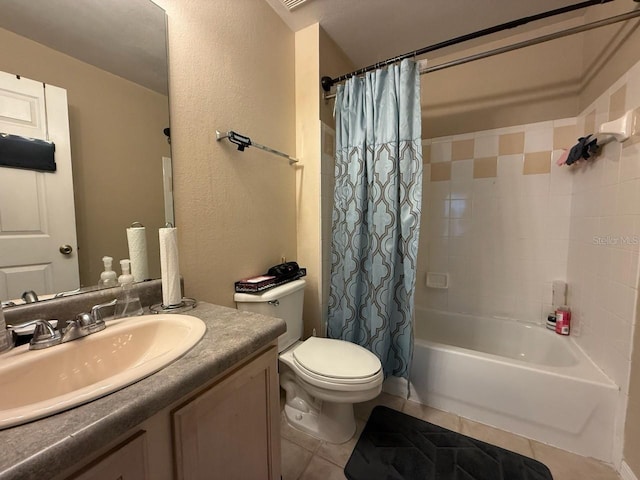 full bathroom with toilet, tile patterned floors, shower / tub combo with curtain, and vanity