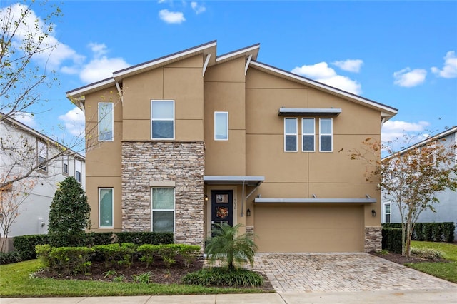 view of front of home with a garage