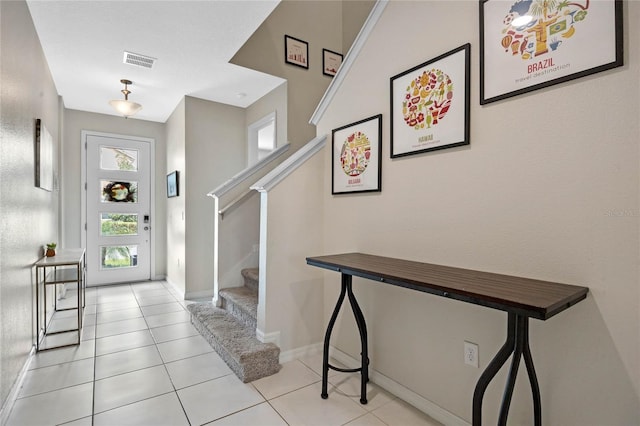 foyer with light tile patterned floors