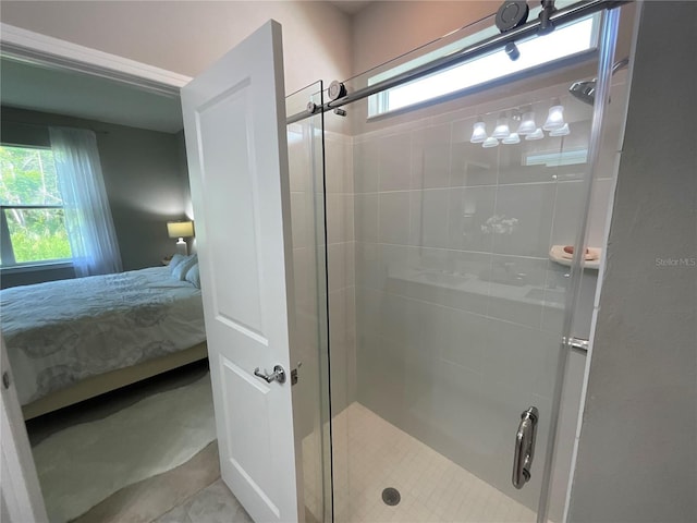 ensuite bathroom featuring a stall shower and ensuite bath