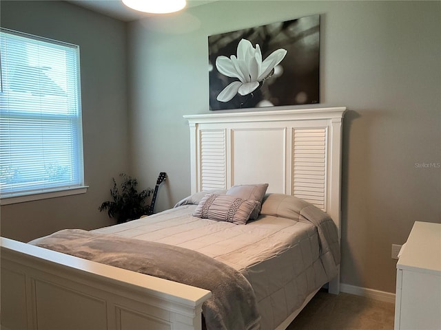 bedroom with baseboards