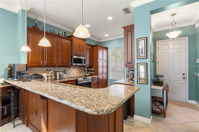 kitchen featuring stainless steel appliances, tasteful backsplash, ornamental molding, decorative light fixtures, and kitchen peninsula