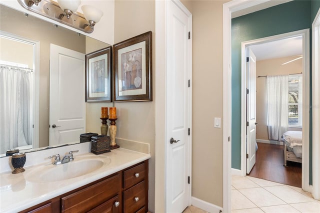 bathroom with tile patterned flooring and vanity