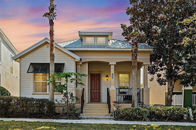 view of front of home with covered porch