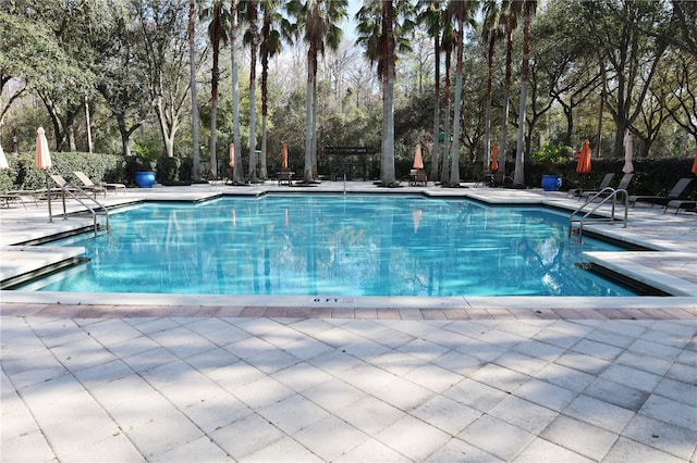 770 Siena Palm Dr Unit 201, Celebration, FL 34747 - community pool featuring a patio