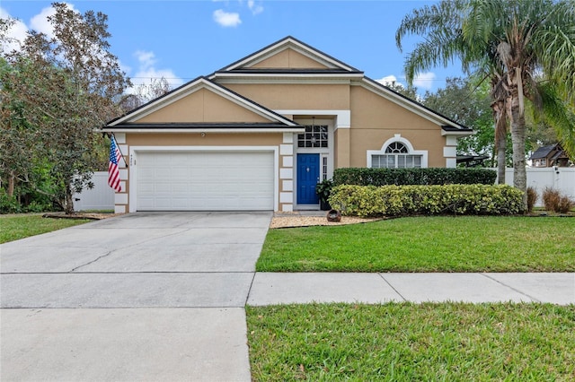 single story home with a front yard and a garage