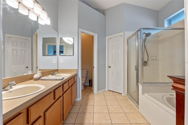 full bathroom featuring separate shower and tub, vanity, tile patterned flooring, and toilet