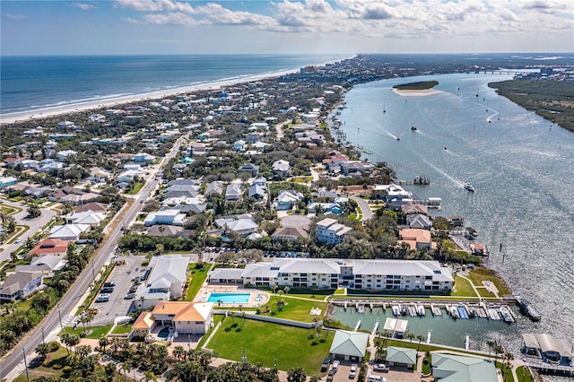 birds eye view of property featuring a residential view and a water view