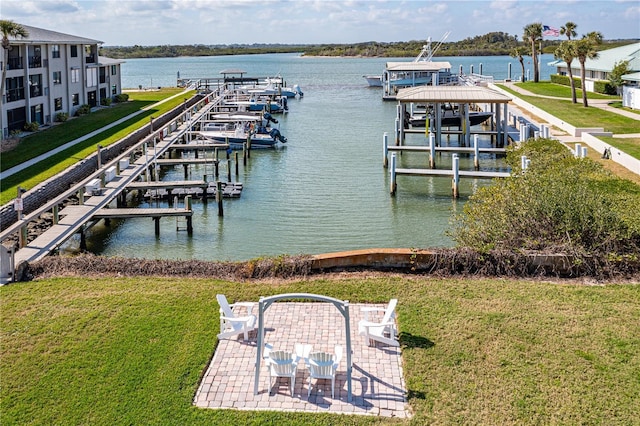 view of dock featuring a yard and a water view