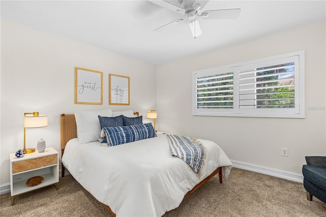 bedroom with baseboards, carpet, and a ceiling fan