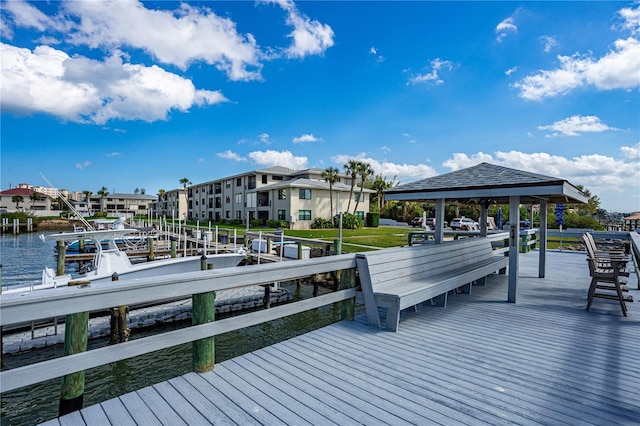 dock area featuring a gazebo and a water view