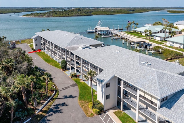 drone / aerial view with a water view