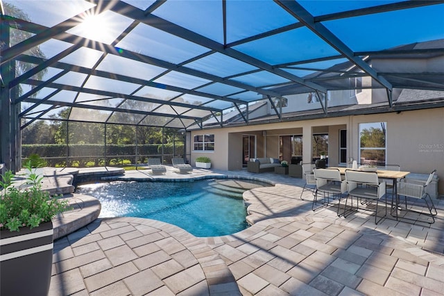 pool with a hot tub, a lanai, outdoor dining area, a patio area, and outdoor lounge area