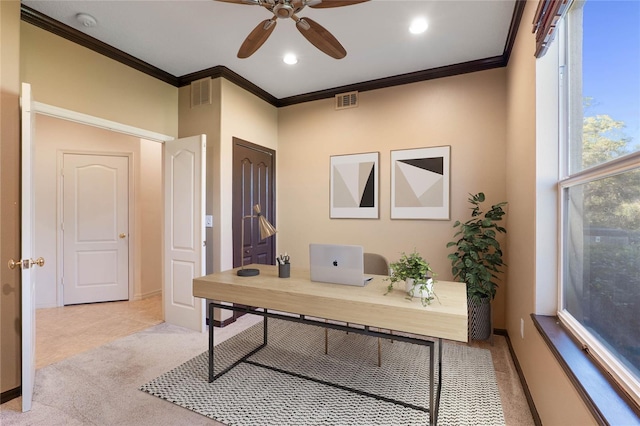 office area with crown molding, visible vents, and light colored carpet