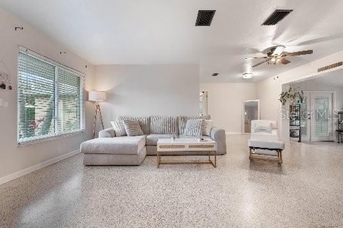 living room featuring ceiling fan