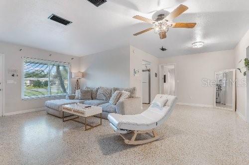 living room with ceiling fan