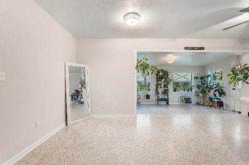 empty room with a textured ceiling