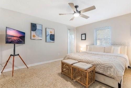 bedroom featuring ceiling fan