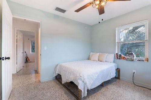 bedroom featuring ceiling fan