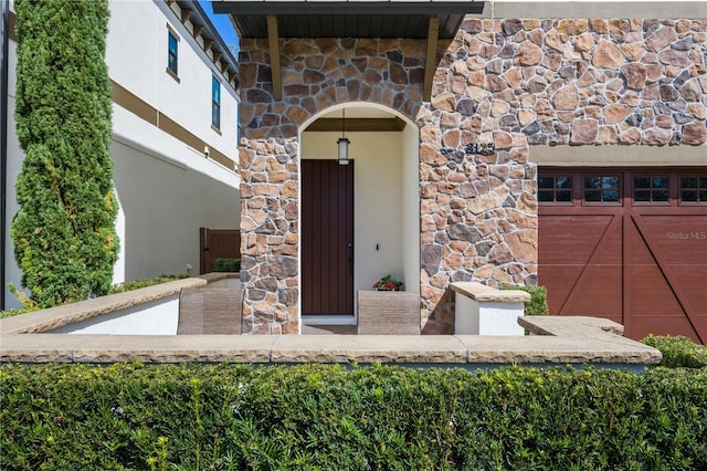 entrance to property with a garage