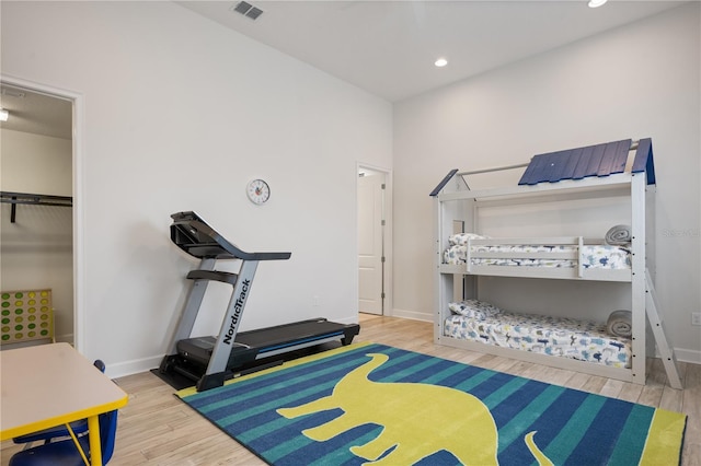 exercise area with hardwood / wood-style flooring