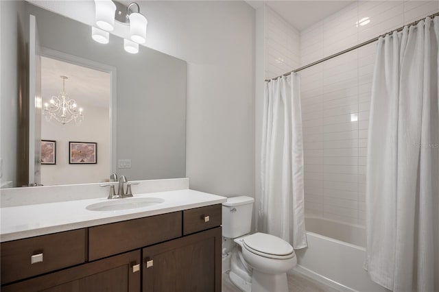 full bathroom with vanity, toilet, and shower / bath combo